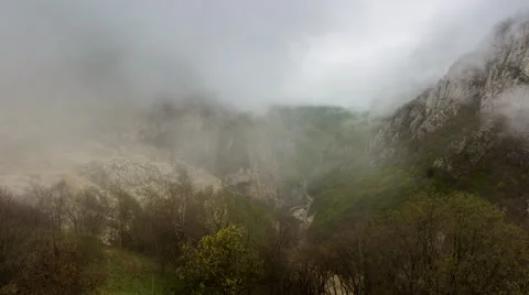 A ray of sun and clouds in the mountains. Video stock 50683856