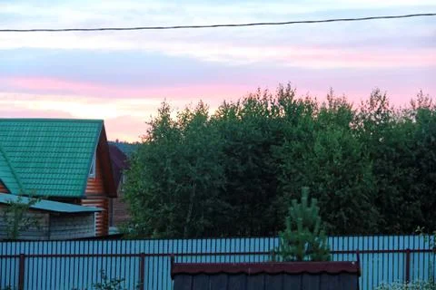 A ray of sun at sunset through clouds Stock Photos