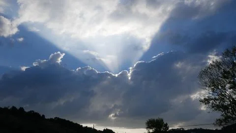 Ray of Sunlight Through Clouds (Wide) Stock Photos