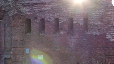 A ray of sunshine next to the building. Old building. Sun in the morning Stock Footage 130739459