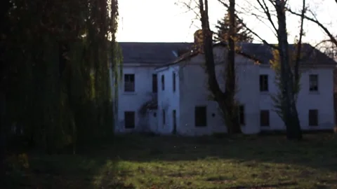 A ray of sunshine next to the building. Old building. Sun in the morning Stock Footage 130739606