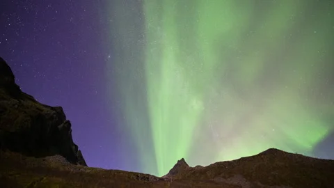 Rays of the Aurora over the mountains Stock Footage 250446753