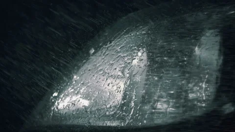 In the rays of headlight light of car ar... | Stock Video | Pond5