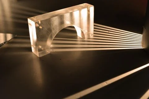 Rays of light are refracted on a black background. Background with a place .. 스톡 사진