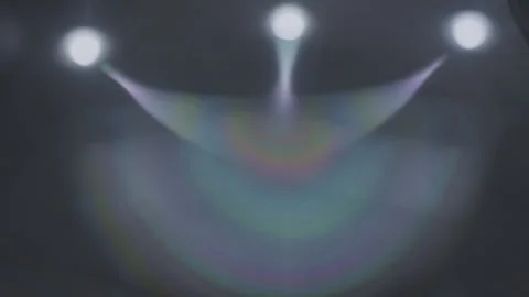 Rays of light bulbs intersect to create rainbow colors in different variations Stock Footage 282519058
