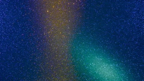 Rays of light of different colors flash on a shiny background Stock Footage 195700973