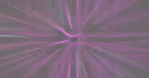 Rays of light of different colors shine from the center. Blurred background. Stock Footage 290032199