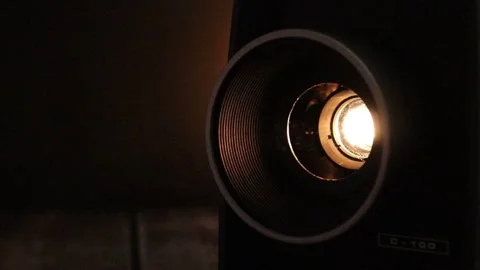 Rays of light emitted by a film projector Stock Footage 255377398