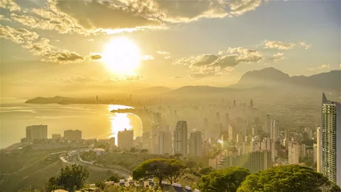 Rays of Light over Modern City Beach Skyline in Benidorm, Spain Stock Footage 233725141