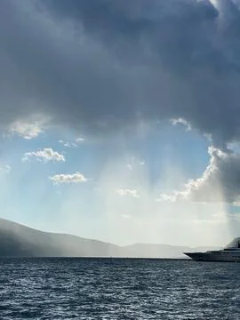 Rays of Light Over Tranquil Sea Foto stock