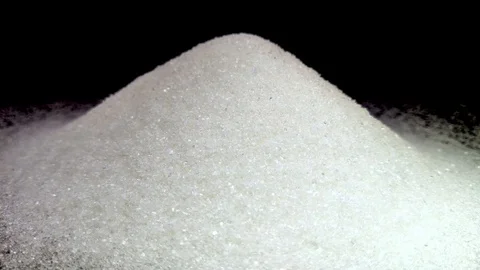 Rays of light pass through the sugar mountain. A play of light from dark tones Stock Footage 125031329