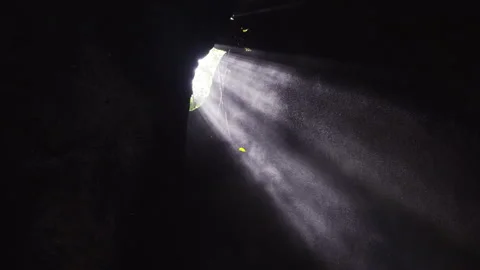 Rays of light penetrating the cave Stock Footage 275577364
