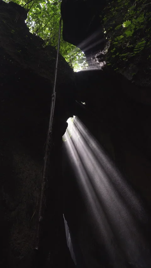 Rays of light penetrating the cave Stock Footage 276590954