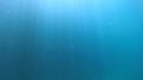 Rays of light seeping into the ocean in the Andaman Sea, Thailand Stock Footage 124718985