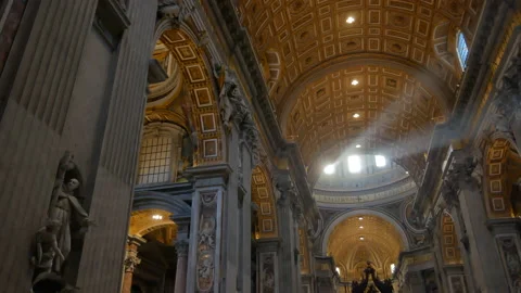 Rays of light shine through windows of the dome of St. Peter's Basilica - 4K Stock Footage 166906486