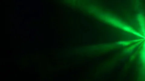 Rays of light in smoke on a black background Stock Footage 94017991