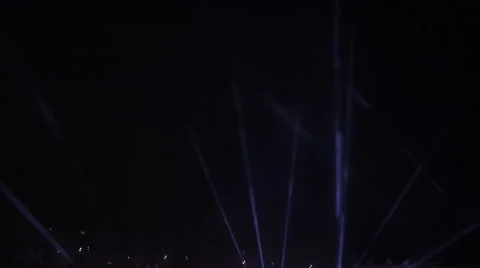 Rays of light from the spotlights in the night sky Stock Footage 68061888