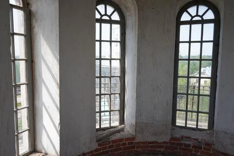 Rays of light through glass in a window church Foto stock