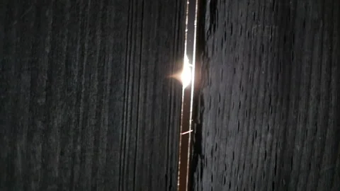 Rays of light through the slits of the door. Stock-Footage 97124540