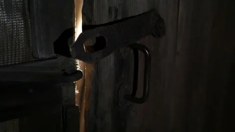 Rays of light through the slits of the door. Stock-Footage 97124994