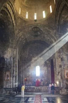 Rays of light thru window inside of church st. Poghos and Petros. in Tatev mo Stock Photos