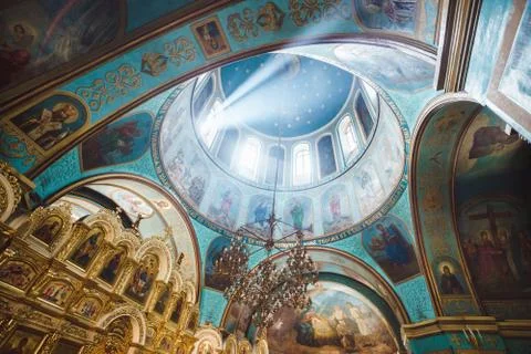 Rays of light under the dome of the temple Stock Photos