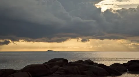 Rays of lights through clouds storm over the sea, Timelapse Stock Footage 11348236
