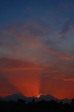 Rays make their way through the clouds Foto stock