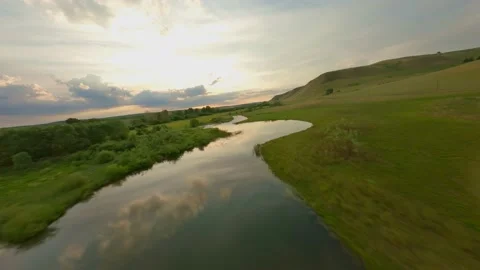 The rays of the setting sun illuminate the picturesque area. Densely covered Stock Footage 157156811