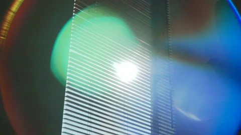 Rays of setting sun through the roller blinds on window, Sunshine over the Video stock 148453198