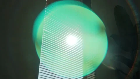 Rays of setting sun through the roller blinds on window, Sunshine over the 스톡 동영상 148453258