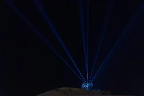 The rays from the spotlights into the night sky Stock Photos