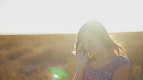 The rays of the summer sun shining on a young female Stock Footage 68821324