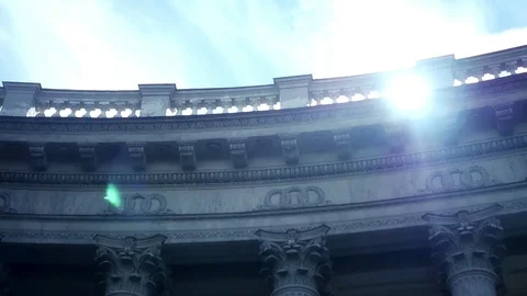 The rays of the sun are reflected in the columns of the cathedral with the Stock Footage 78930989