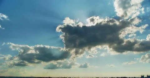 The rays of the sun from behind the clouds Stock Photos