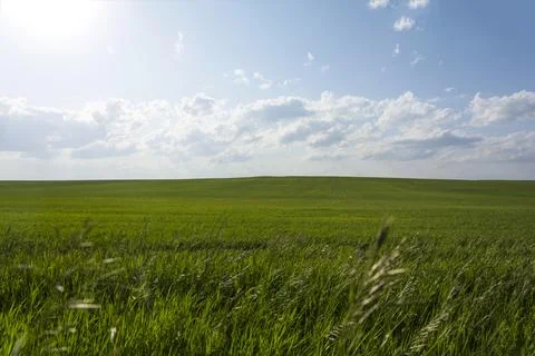 The rays of the sun break through the clouds and illuminate. Stock Photos