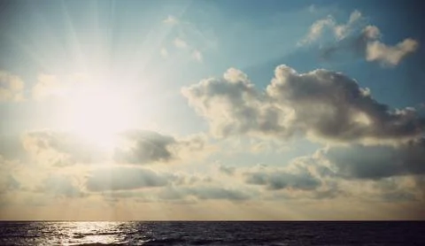 The rays of the sun breaking through clouds Stock Photos
