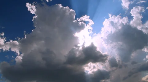 Rays of the sun breaks through the clouds Video stock 30302870
