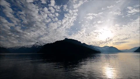 The rays of the sun in the clouds. Mountain Lake. Stock Footage 74183506