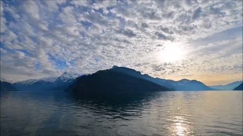 The rays of the sun in the clouds. Mountain Lake. Stock Footage 74183563