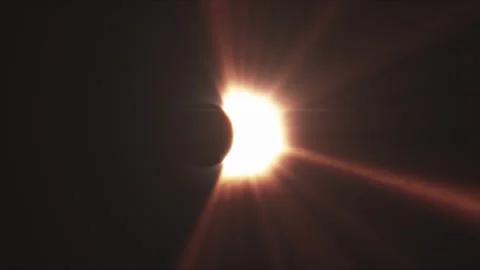 Rays of sun-light, moon covering the sun during Total Solar Eclipse. Stock Footage 247684564