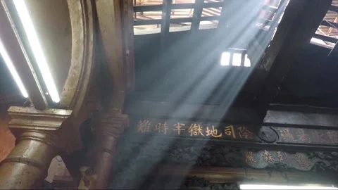 Rays of Sun Light from Roof Windows, Chua Phuoc Hai Temple, Ho Chi Minh, Vietnam Stock Footage 275602920
