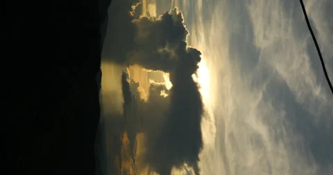 Rays Of Sun Light Through Dark Storm Clouds Vertical Stock Footage 292066346