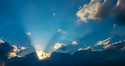 The rays of the sun make their way through the evening clouds Stock Footage 154741693