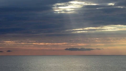 Rays of the sun open the clouds of the sky Video stock 83464015