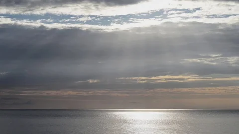 Rays of the sun open the clouds of the sky Stock Footage 83464188