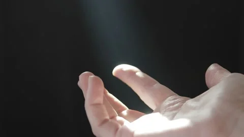 The rays of the sun play on the female palm. Sun glare. The play of light and sh Stock Footage 233001516