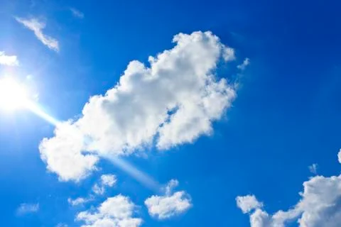 Rays of the sun through the clouds Stock Photos