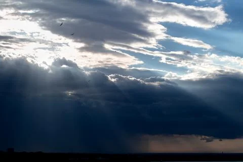 Rays of Sun through the clouds Stock-Fotos