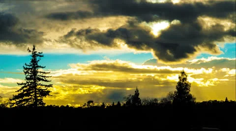 The rays of the sun through the clouds. time laps. ultrahd 4k video Stock Footage 22636749